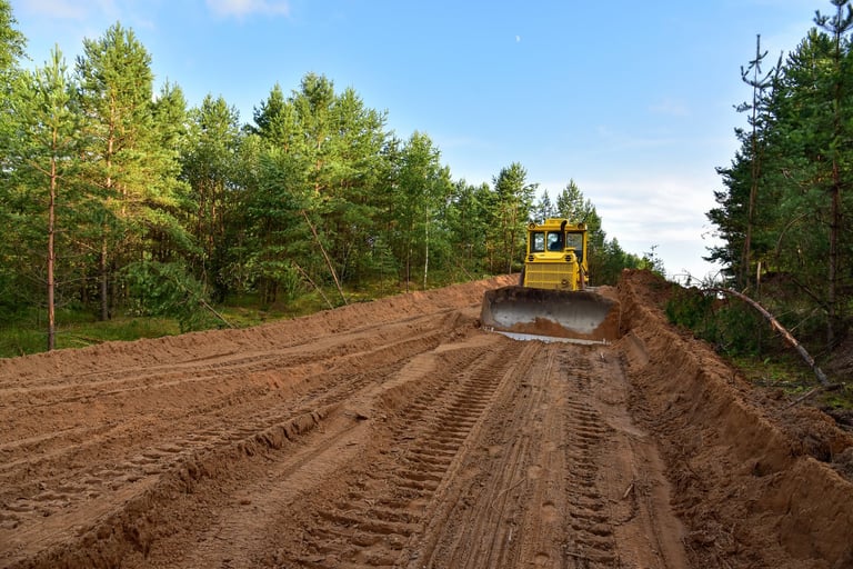 Construction site clearing with bulldozer